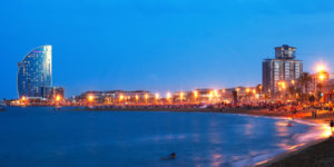 Barcelona city bay evening beach with lights