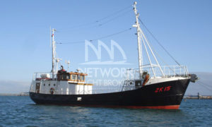 Trawler yacht at anchor